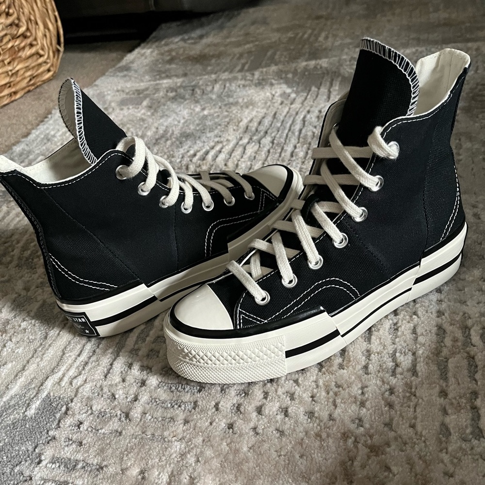 Converse Black and White High-Top Athletic Shoes